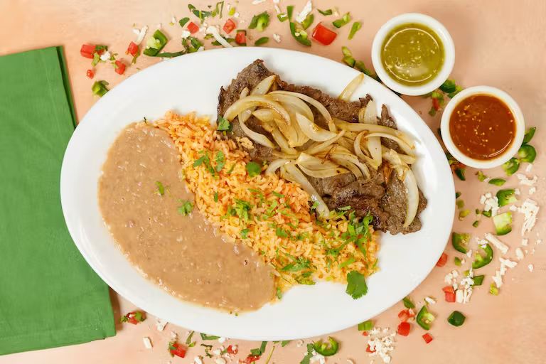 Bistec Encebollado at Tommy's Tacos y Mas in Boca Raton, FL 33428 | YourMenu® Online Ordering