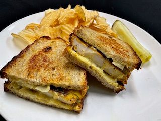 Honey Artichoke Chicken at Marigold Bistro in Colorado Springs, CO 80906 | YourMenu® Online Ordering