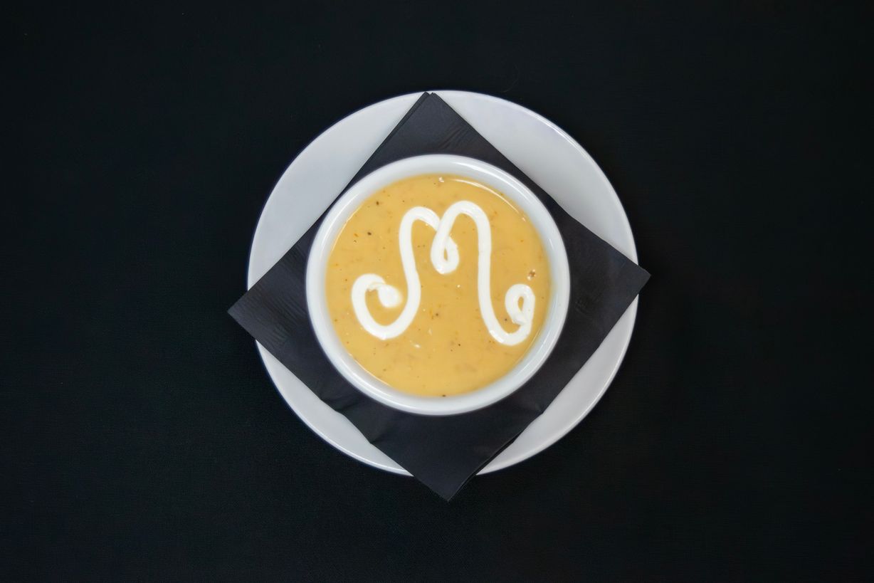 Cup Lobster Bisque at Marigold Bistro in Colorado Springs, CO 80906 | YourMenu® Online Ordering