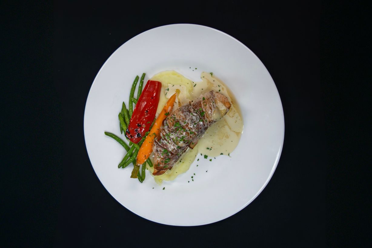 Stuffed Salmon at Marigold Bistro in Colorado Springs, CO 80906 | YourMenu® Online Ordering
