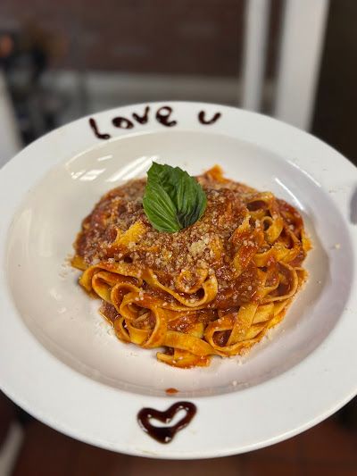 Bolognese Pasta at NapulEATan Pizzeria & Deli in Fort Lauderdale, FL 33308 | YourMenu® Online Ordering