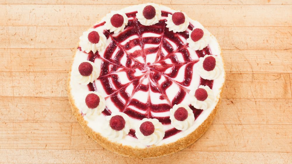 Raspberry Cheesecake at Marigold Cafe & Bakery - Cake Menu in Colorado Springs, CO 80919 | YourMenu® Online Ordering