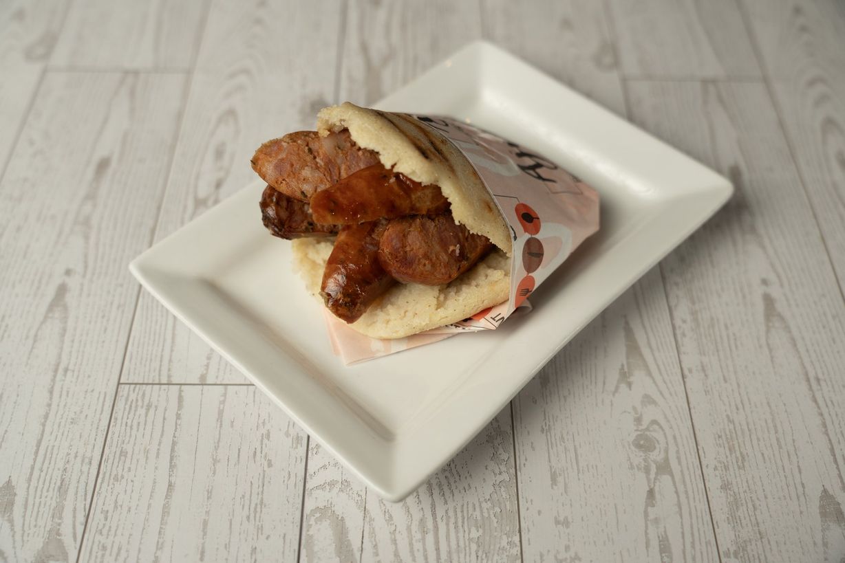 Arepa Venezolana con Chorizo at Ajiacos Restaurant in Hallandale Beach, FL 33009 | YourMenu® Online Ordering