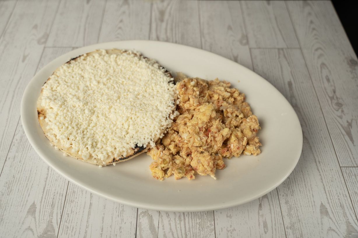 Arepa Colombiana con Queso at Ajiacos Restaurant in Hallandale Beach, FL 33009 | YourMenu® Online Ordering