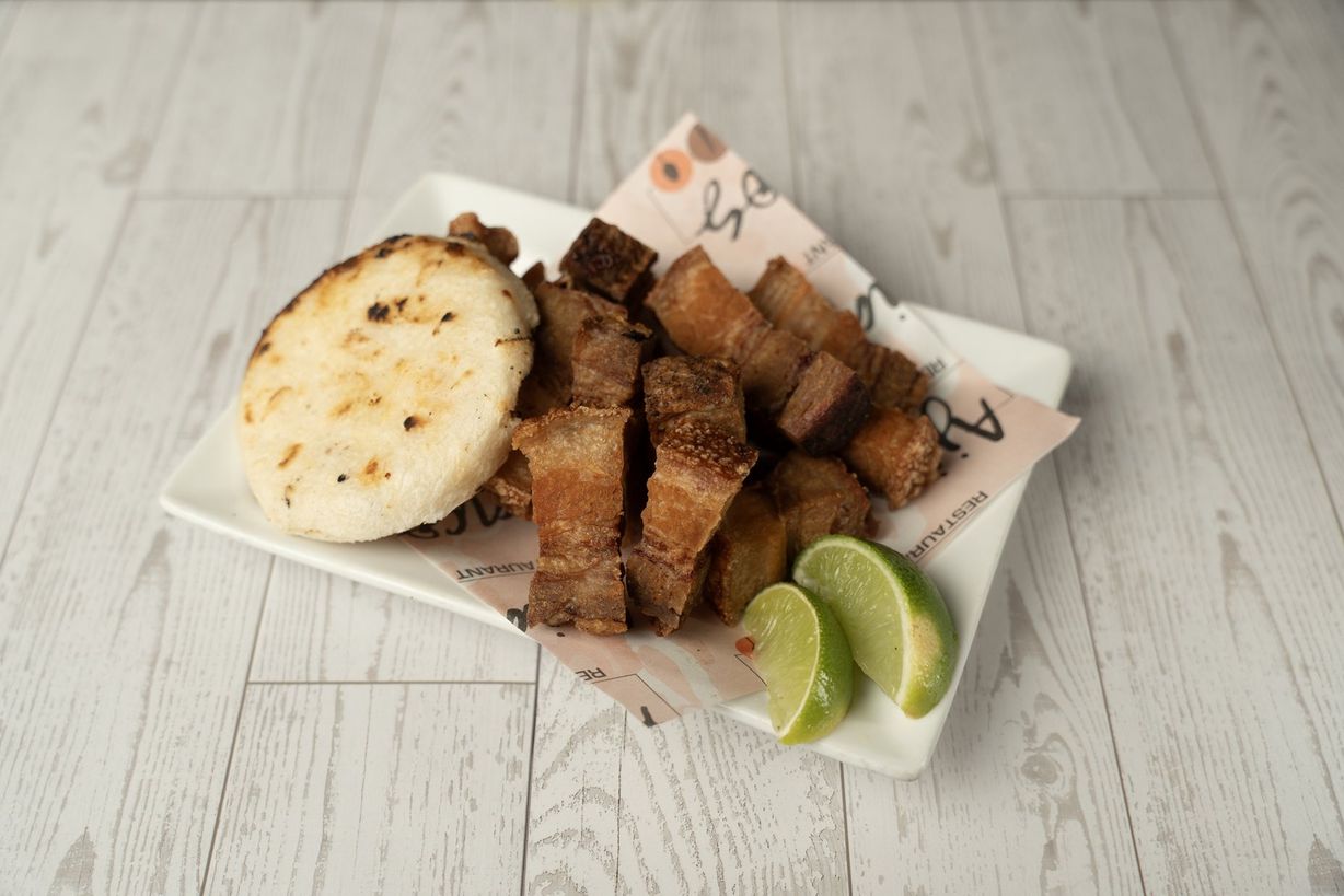 Chicharron con arepita at Ajiacos Restaurant in Hallandale Beach, FL 33009 | YourMenu® Online Ordering