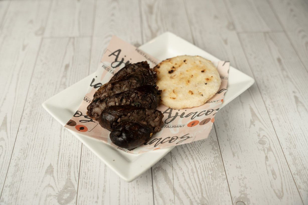 Morcilla con arepita at Ajiacos Restaurant in Hallandale Beach, FL 33009 | YourMenu® Online Ordering