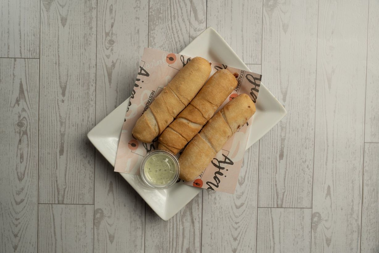 Porcion Tequenos at Ajiacos Restaurant in Hallandale Beach, FL 33009 | YourMenu® Online Ordering