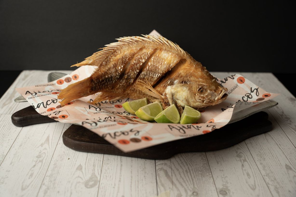 Mojarra Frita at Ajiacos Restaurant in Hallandale Beach, FL 33009 | YourMenu® Online Ordering