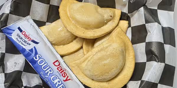 5 Pierogies W/ Sour Cream at Shicky's Wings N' Things in Mount Carmel, PA 17851 | YourMenu® Online Ordering