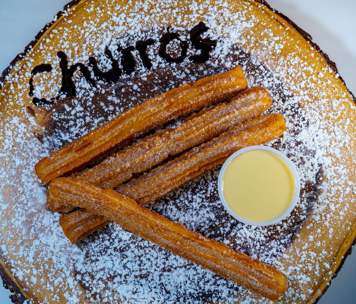 Churro De Leche Condensada at Rikat's Pizza in NAPLES, FL 34120 | YourMenu® Online Ordering