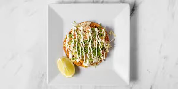 Tostada Pollo at Tacos y Antojitos Emanuel Restaurant #3 in Palm Beach Gardens, FL 33418 | YourMenu® Online Ordering