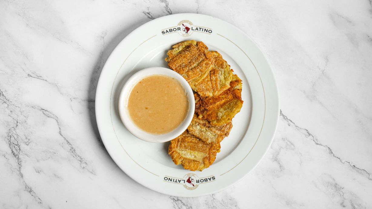 TOSTONES CON AJO at Sabor Latino Restaurant | Boynton Beach in Boynton Beach, FL 33426 | YourMenu® Online Ordering