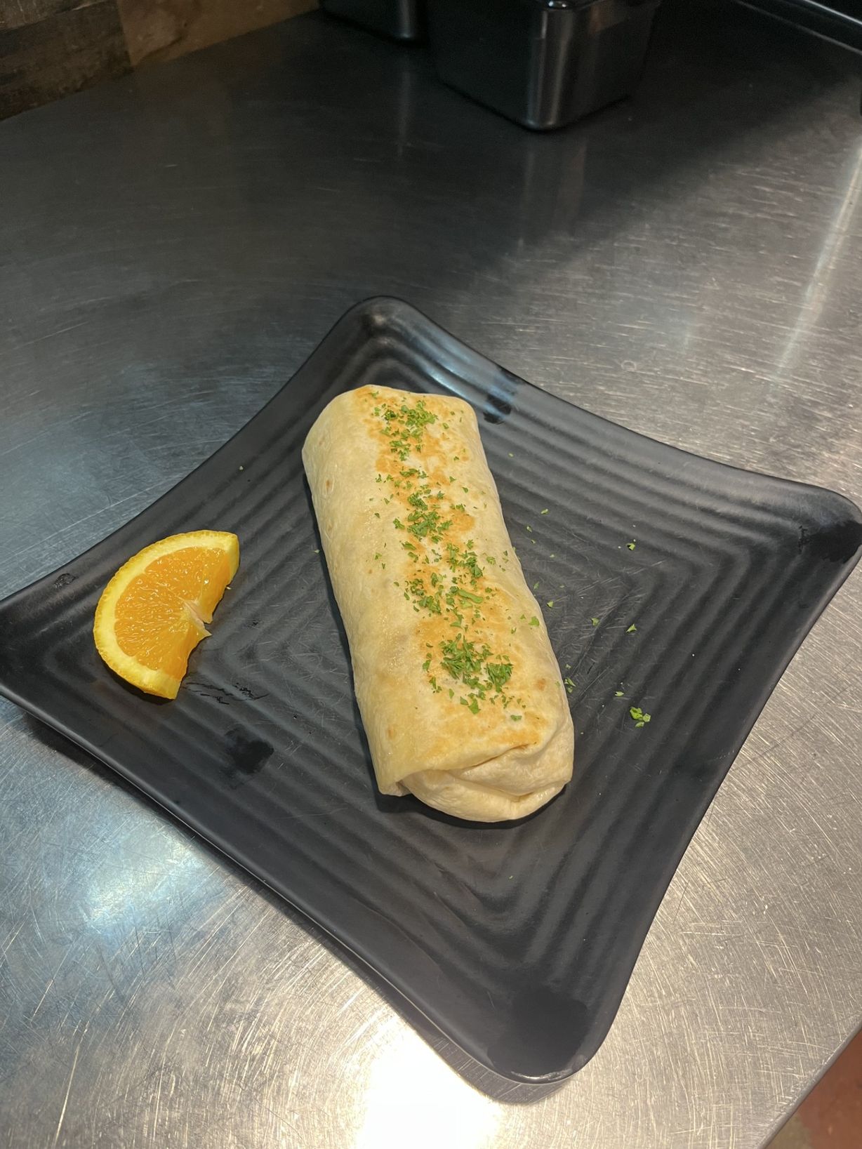 Breakfast Burrito at The Exchange in Colorado Springs, CO 80903 | YourMenu® Online Ordering