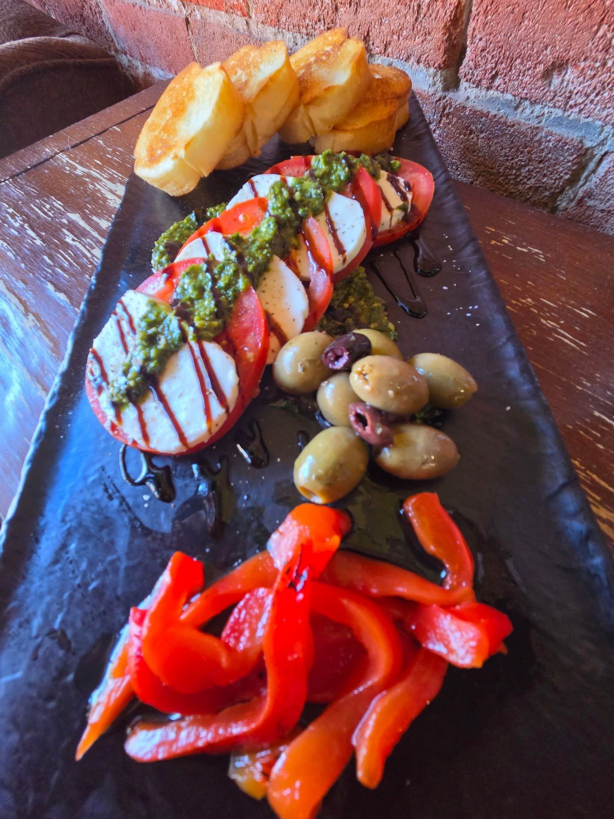 Insalata Caprese at The Exchange in Colorado Springs, CO 80903 | YourMenu® Online Ordering