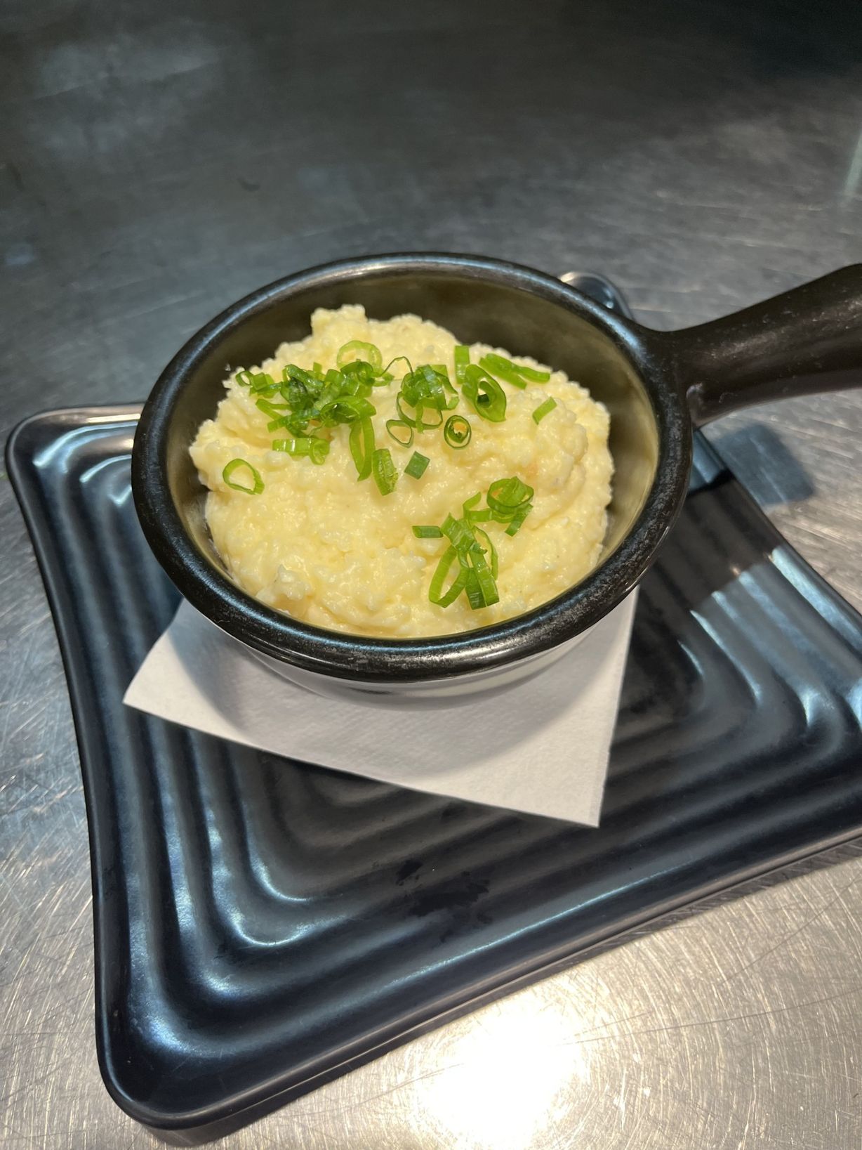 Side Of Cheesy Grits at The Exchange in Colorado Springs, CO 80903 | YourMenu® Online Ordering