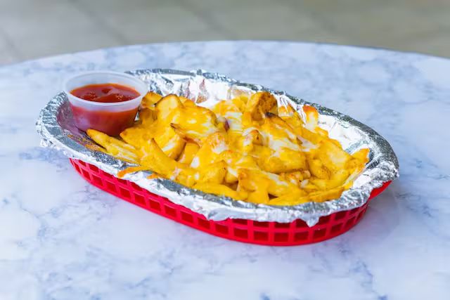 Cheese Fries at New Brother's Pizza & Tex-Mex in Chambersburg, PA 17202 | YourMenu® Online Ordering