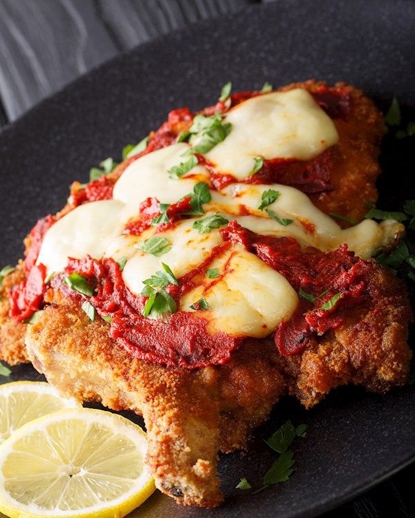 Milanesa Napolitana at Kincho Argentinian Street Food (Food Truck) in Fort Lauderdale, FL 33315 | YourMenu® Online Ordering