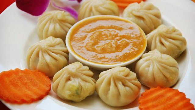 Chicken Steam Momo With Mexican Coke at Olives Pizza & Grill Indian Cuisine in GAINESVILLE, VA 20155 | YourMenu® Online Ordering