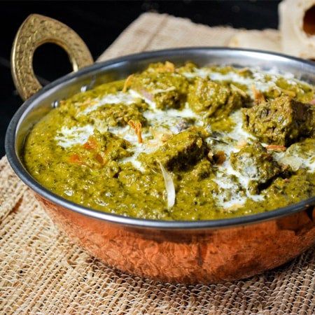 Goat Saag at Olives Pizza & Grill Indian Cuisine in GAINESVILLE, VA 20155 | YourMenu® Online Ordering