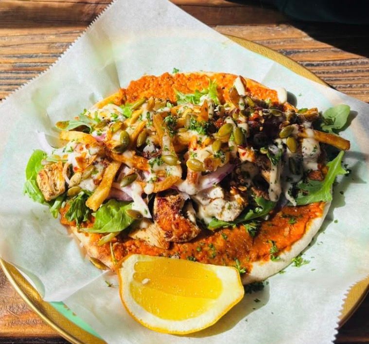 Blessed Art Thou Amongst Women (Grilled Lemon Chicken on Pita) at Meadowlark Bakery & Cafe in WARMINSTER, PA 18974 | YourMenu® Online Ordering