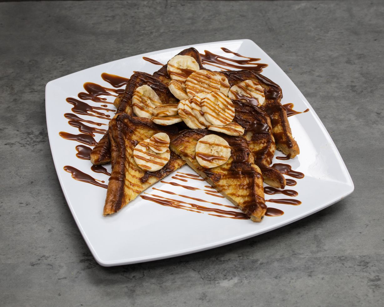 Banana Foster Pancakes at Sweet Mama's Restaurant in Orlando, FL 32832 | YourMenu® Online Ordering
