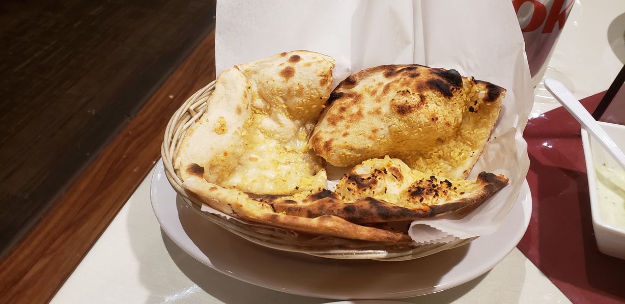 Garlic Naan at Zaiqa Restaurant and Grill in HANOVER, MD 210761433 | YourMenu® Online Ordering