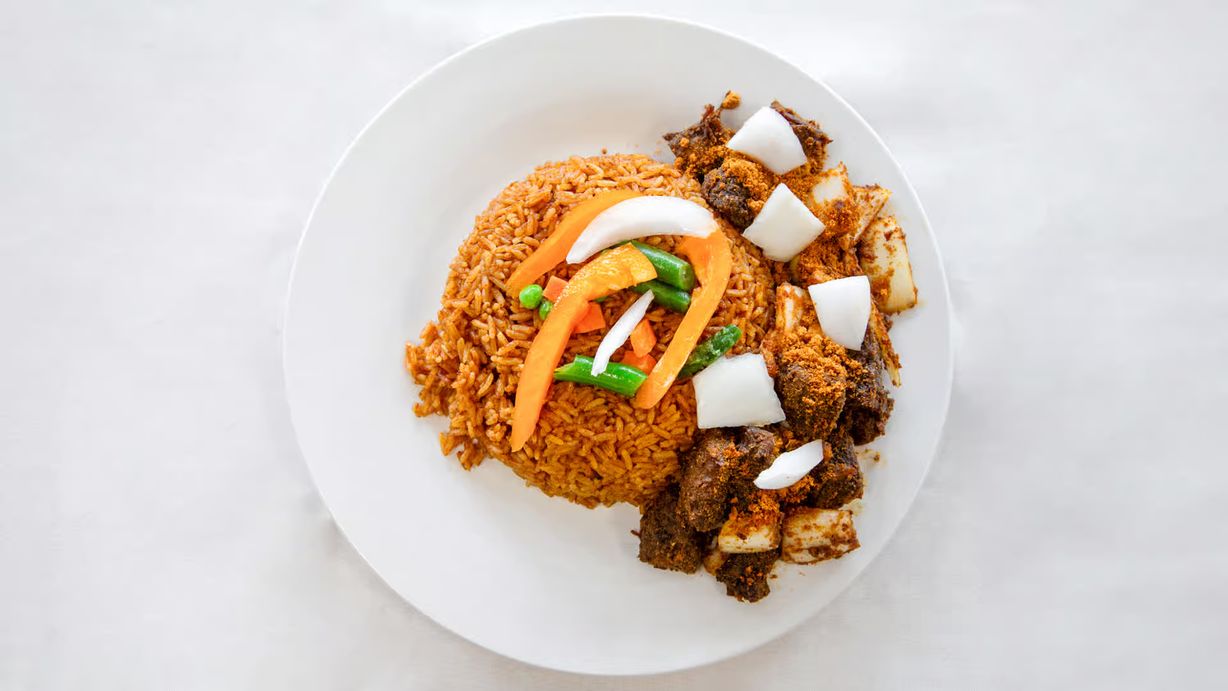 Jollof Rice & Vegetables at Vieve's Cuisine in Laurel, MD 20708 | YourMenu® Online Ordering
