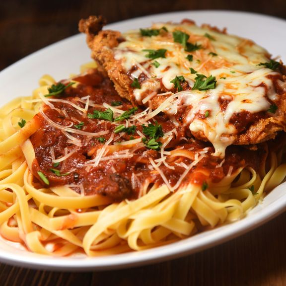 Eggplant Parmesan at Carmine's Pizza Downtown in DALLAS, TX 75201 | YourMenu® Online Ordering