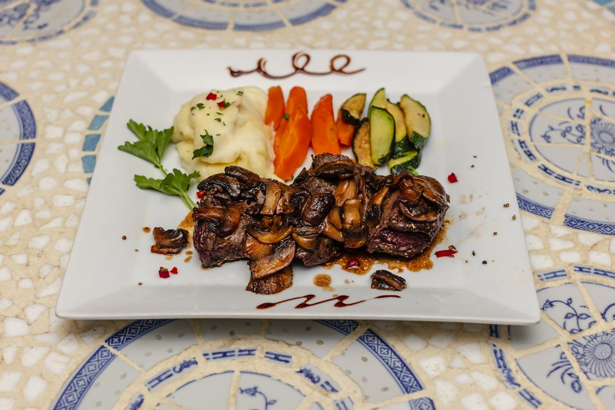 Medalhões de Bife c/ vinho de Borba -Tinto at Tavira Restaurant in Chevy Chase, MD 20815 | YourMenu® Online Ordering