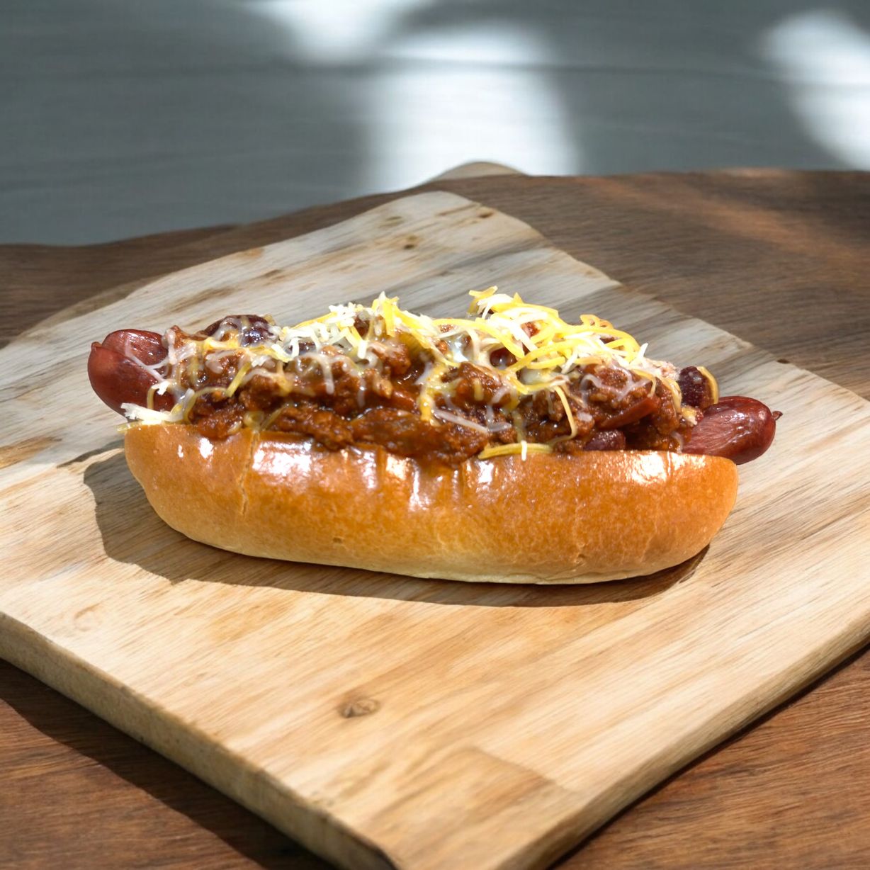Cheesy Chili Hot Dog Supreme at Blowin' Smoke BBQ @ Prime Time Butcher in WOODBURY, NY 11797 | YourMenu® Online Ordering