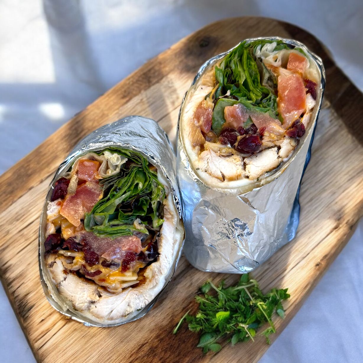 Grilled Chicken Mozzaboom Wrap at Blowin' Smoke BBQ @ Prime Time Butcher in WOODBURY, NY 11797 | YourMenu® Online Ordering