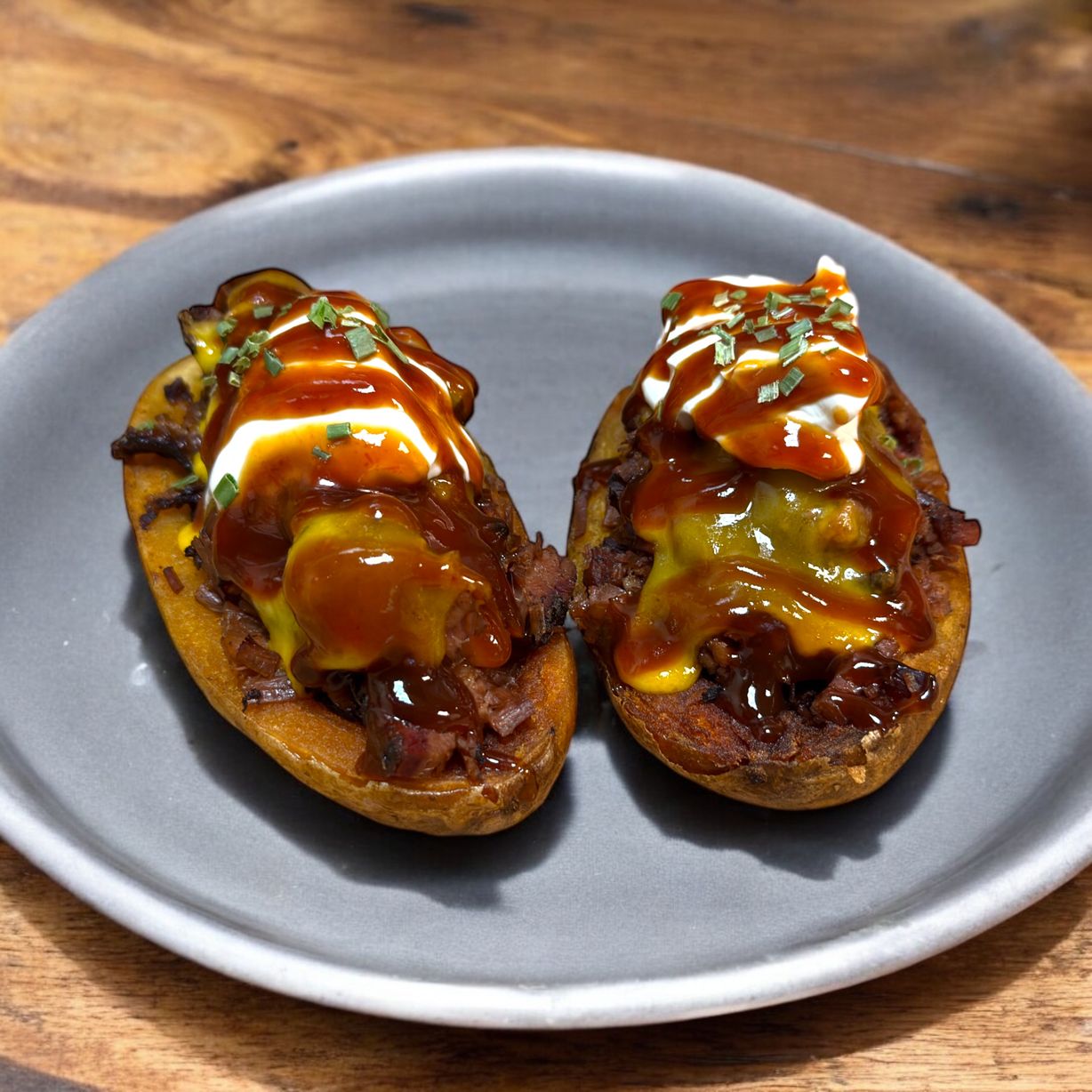 Stuffed Smokehouse Spud at Blowin' Smoke BBQ @ Prime Time Butcher in WOODBURY, NY 11797 | YourMenu® Online Ordering