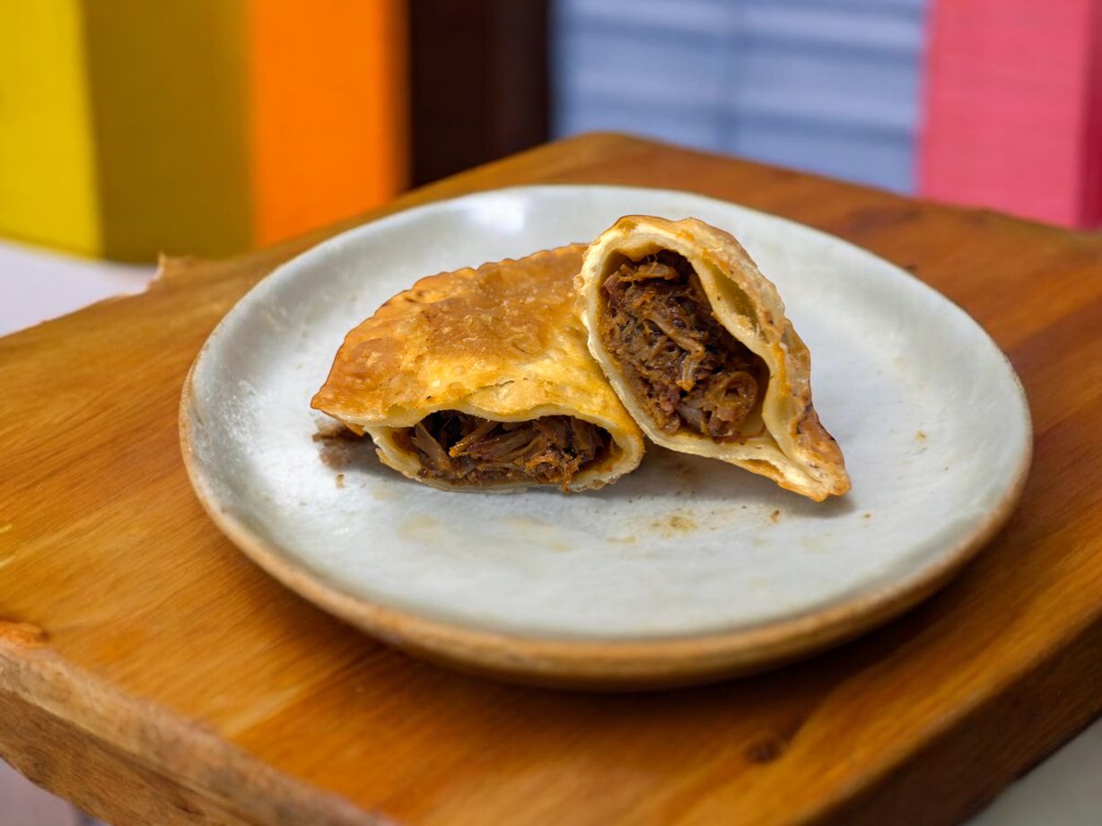 Pulled Pork Empanadas (2 pcs) at Blowin' Smoke BBQ @ Prime Time Butcher in WOODBURY, NY 11797 | YourMenu® Online Ordering