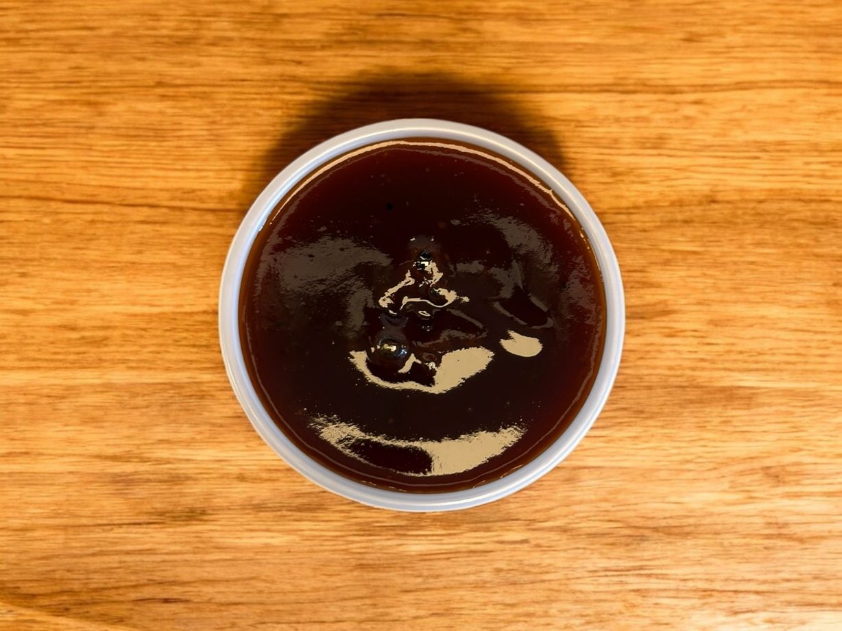 Side Sweet & Savory BBQ Sauce at Blowin' Smoke BBQ @ Prime Time Butcher in WOODBURY, NY 11797 | YourMenu® Online Ordering