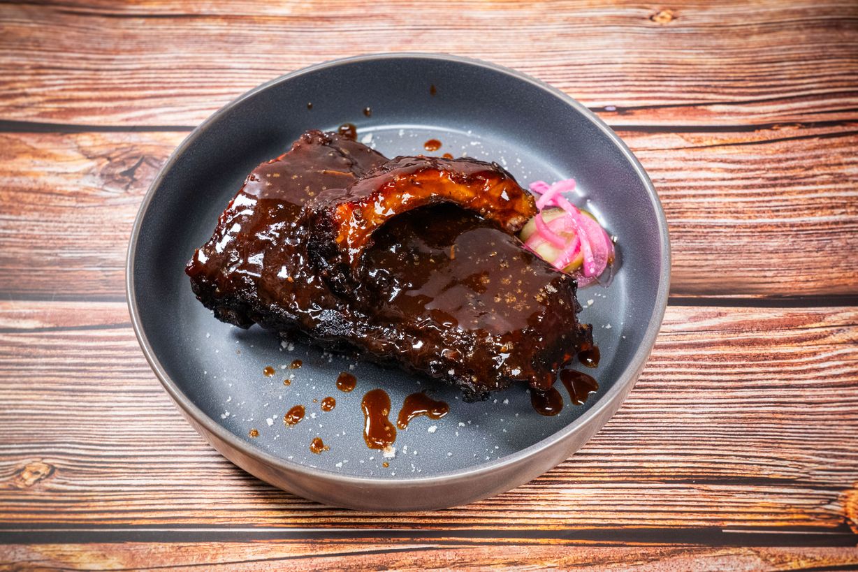 1/2 Rack Baby Back Ribs at Blowin' Smoke BBQ @ Prime Time Butcher in WOODBURY, NY 11797 | YourMenu® Online Ordering