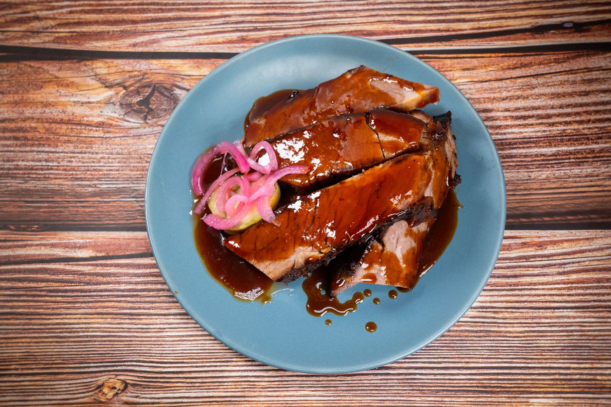 Smoked Braised Sliced Brisket By The Pound at Blowin' Smoke BBQ @ Prime Time Butcher in WOODBURY, NY 11797 | YourMenu® Online Ordering