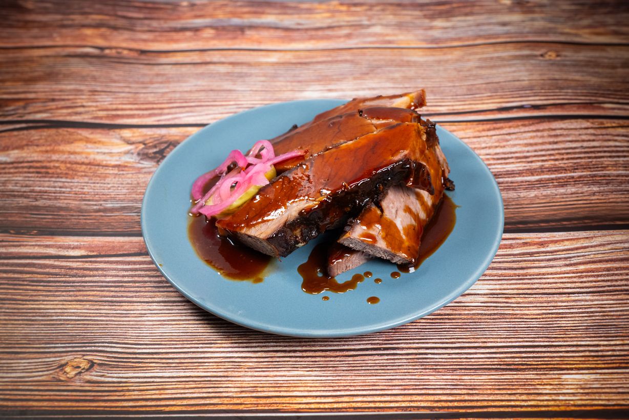 Smoked Braised Sliced Brisket By The 1/2 Pound at Blowin' Smoke BBQ @ Prime Time Butcher in WOODBURY, NY 11797 | YourMenu® Online Ordering