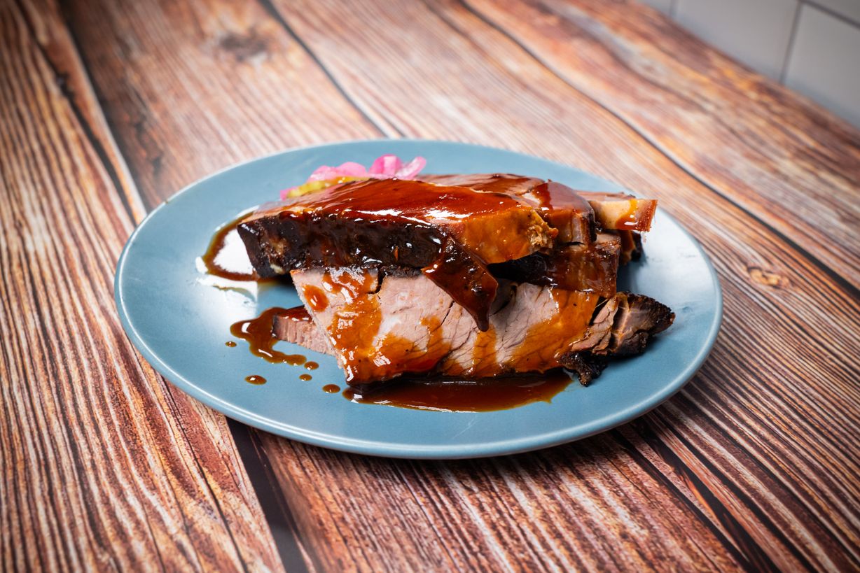 Sliced Smoked Braised Brisket Platter at Blowin' Smoke BBQ @ Prime Time Butcher in WOODBURY, NY 11797 | YourMenu® Online Ordering