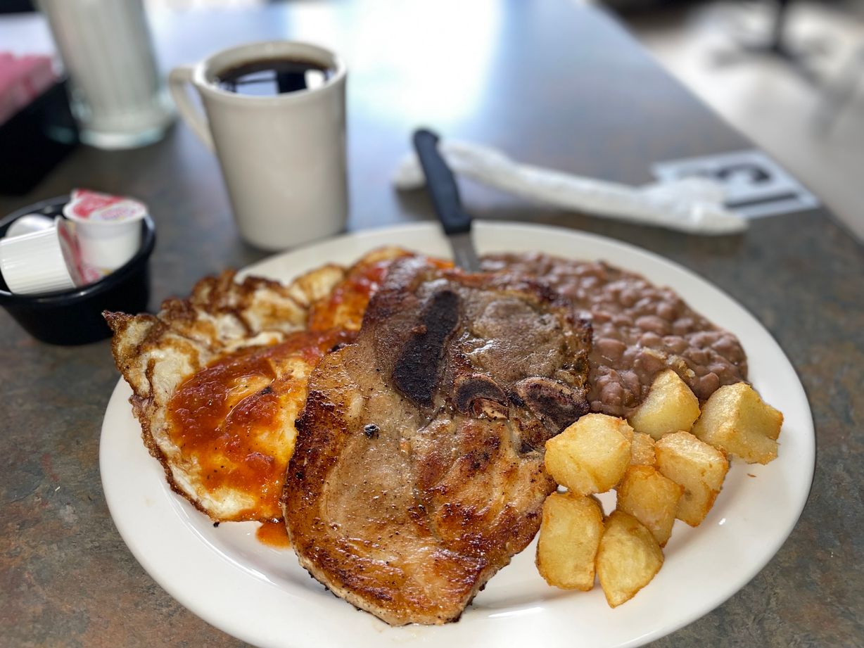 Huevos Rancheros-Eggs Ranchero S. at La Fruta Feliz in Austin, TX 78723 | YourMenu® Online Ordering