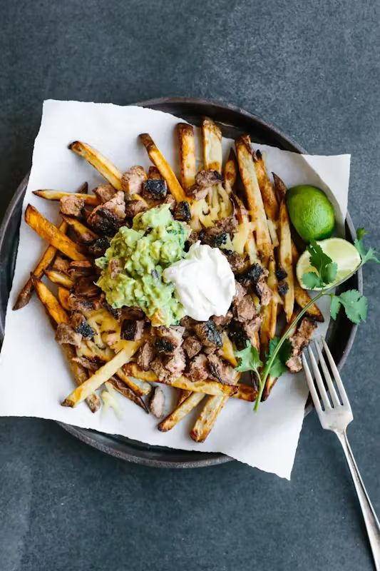 Asada Fries at Taco and Chelas in DORAL, FL 33166 | YourMenu® Online Ordering