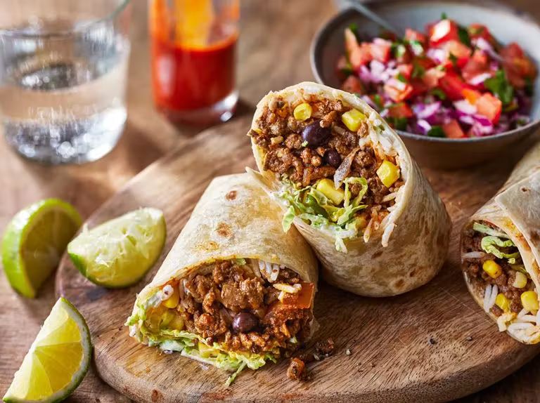 Burrito (Add Protein) at Taco and Chelas in DORAL, FL 33166 | YourMenu® Online Ordering
