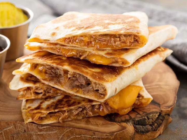 Quesadilla Pork Belly at Taco and Chelas in DORAL, FL 33166 | YourMenu® Online Ordering