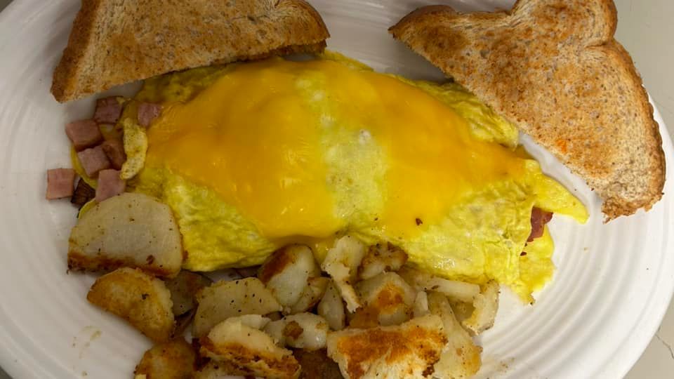 SAUSAGE OR HAM OMELETTE at Dellantina’s Eatery in Kittanning, PA 16201 | YourMenu® Online Ordering