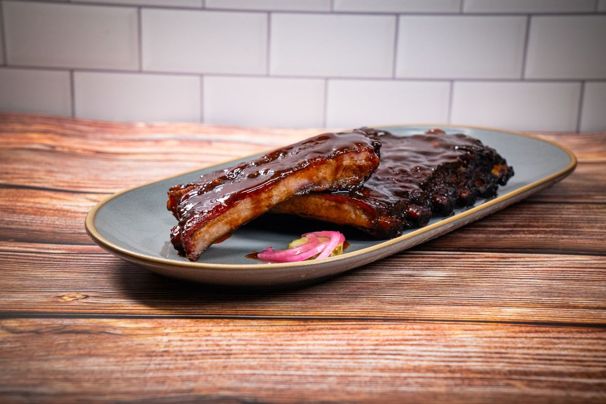 1/2 Tray - St. Louis Ribs at Blowin' Smoke BBQ @ Prime Time Butcher | Catering in WOODBURY, NY 117971212 | YourMenu® Online Ordering