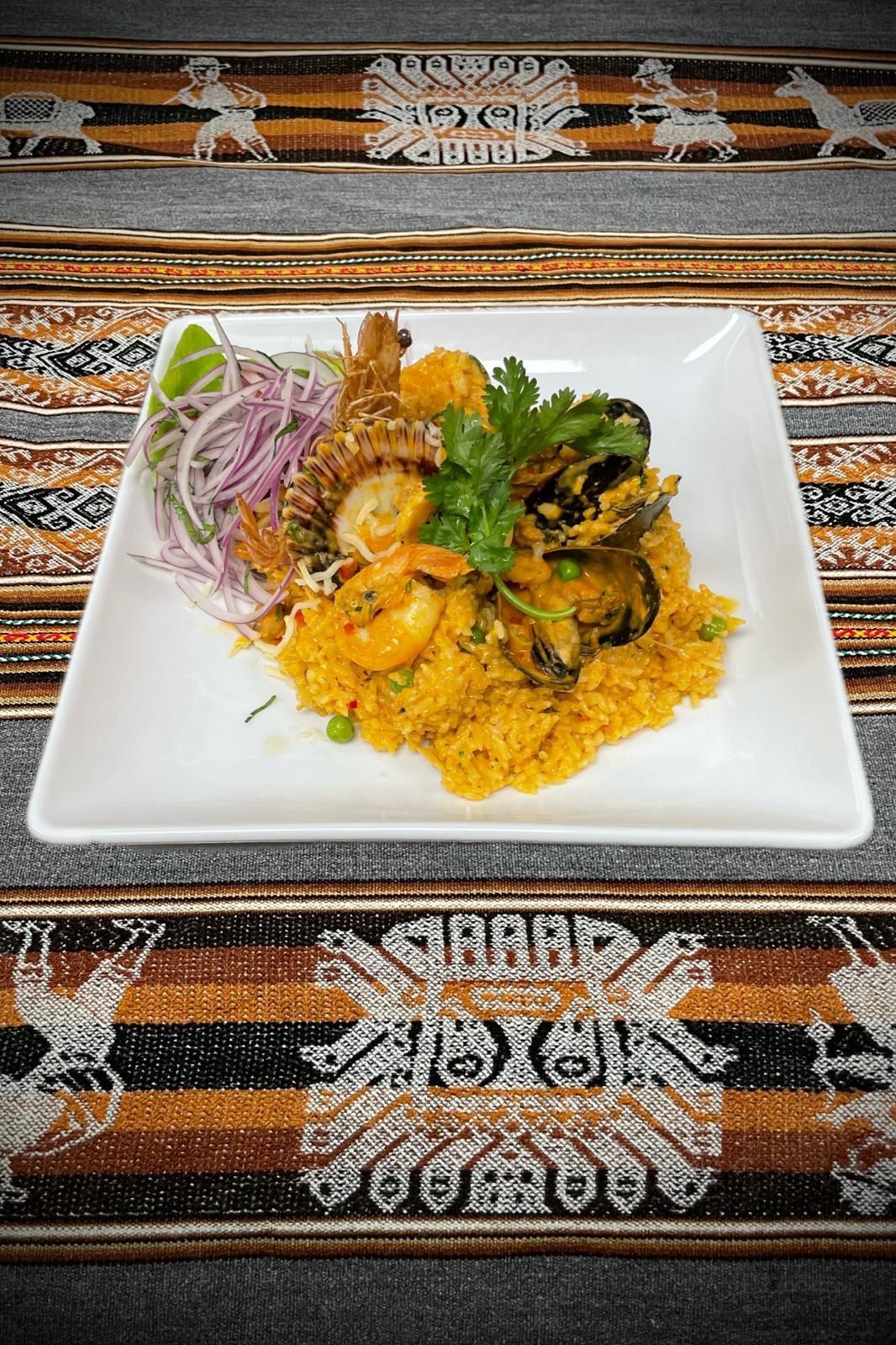 Arroz Con Marisco at La Caleta Peruvian Restaurant in Gaithersburg, MD 20877 | YourMenu® Online Ordering