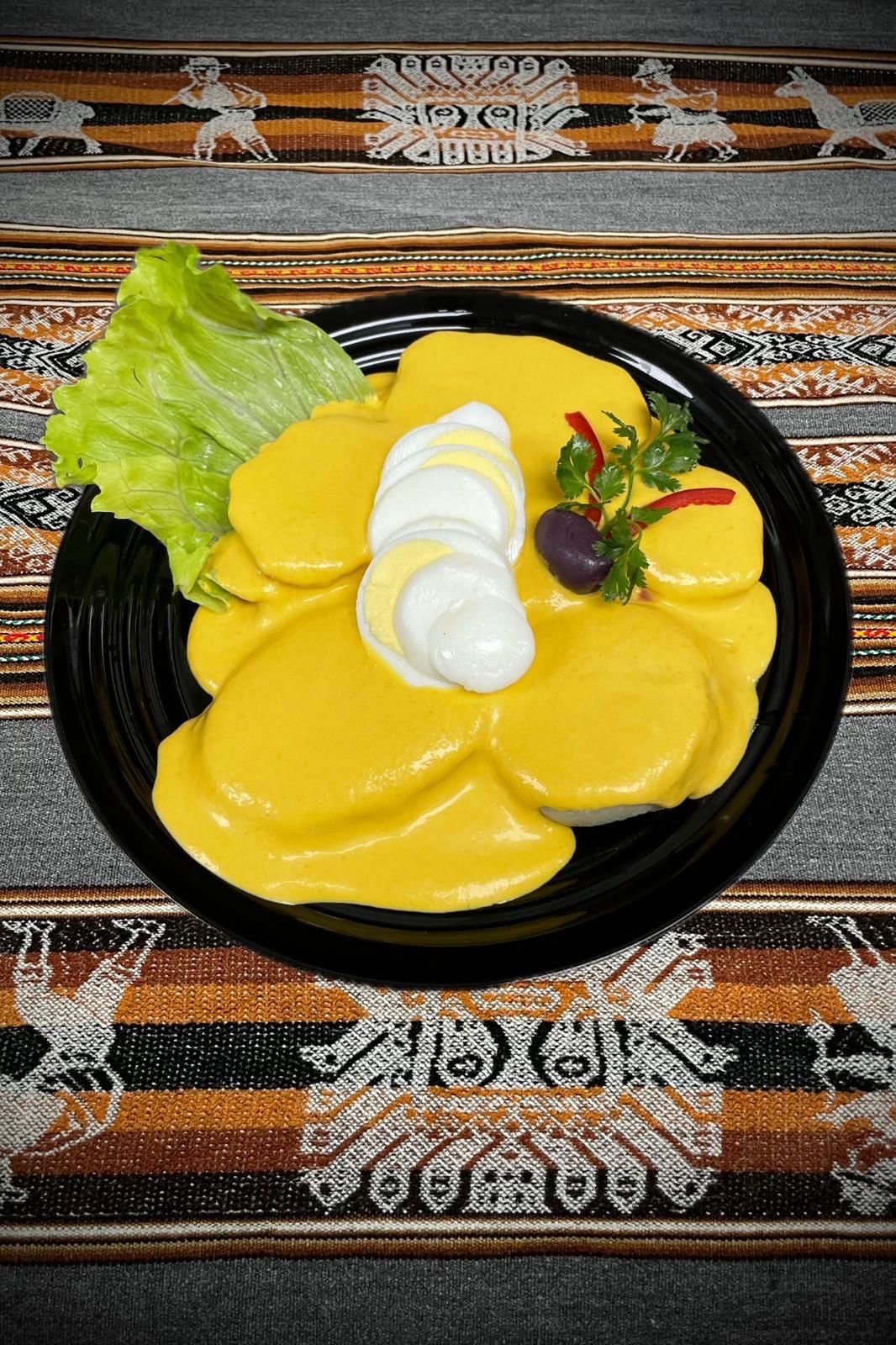 Papa a la Huancaina at La Caleta Peruvian Restaurant in Gaithersburg, MD 20877 | YourMenu® Online Ordering
