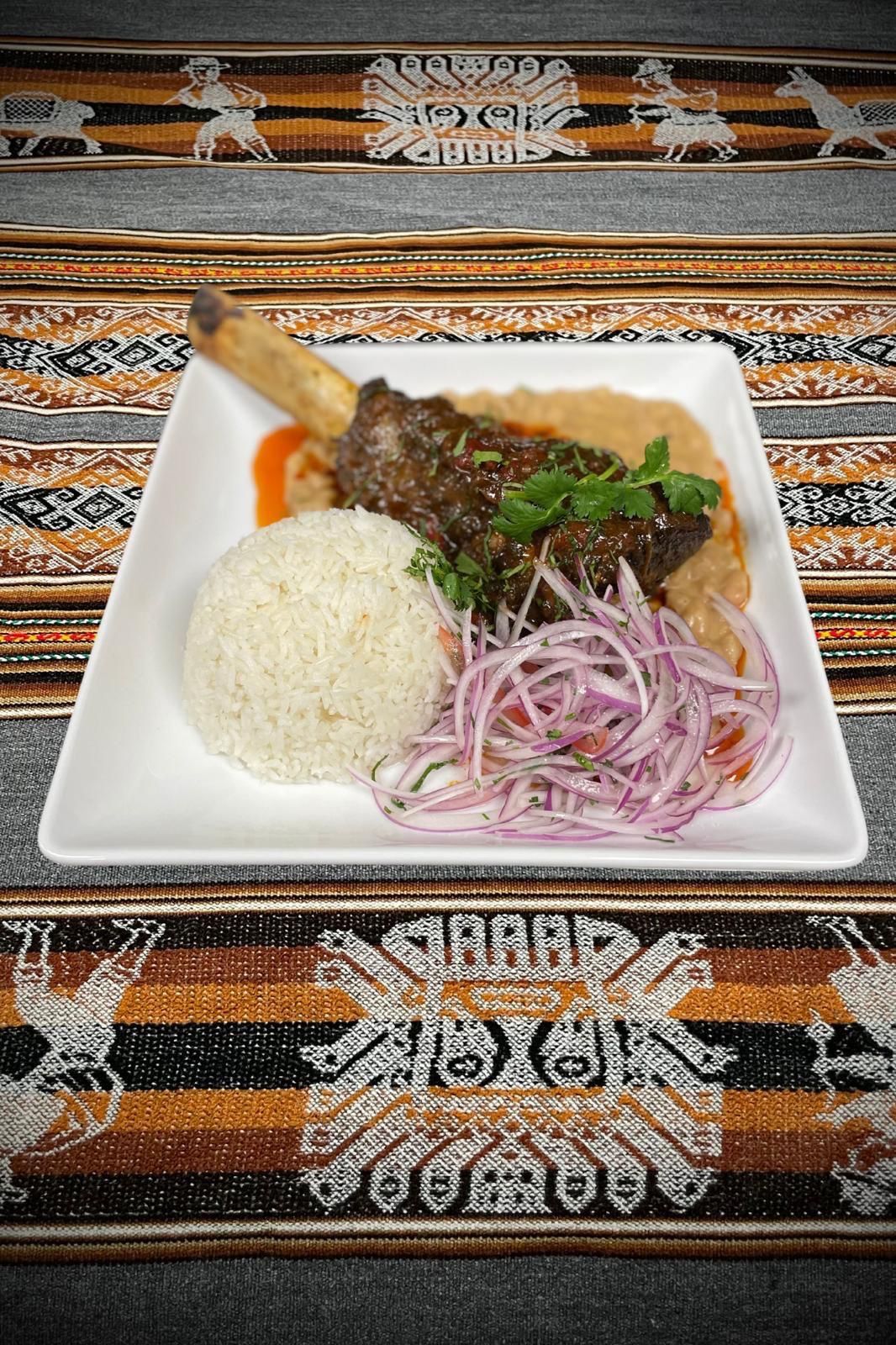 Seco A La Nortena at La Caleta Peruvian Restaurant in Gaithersburg, MD 20877 | YourMenu® Online Ordering