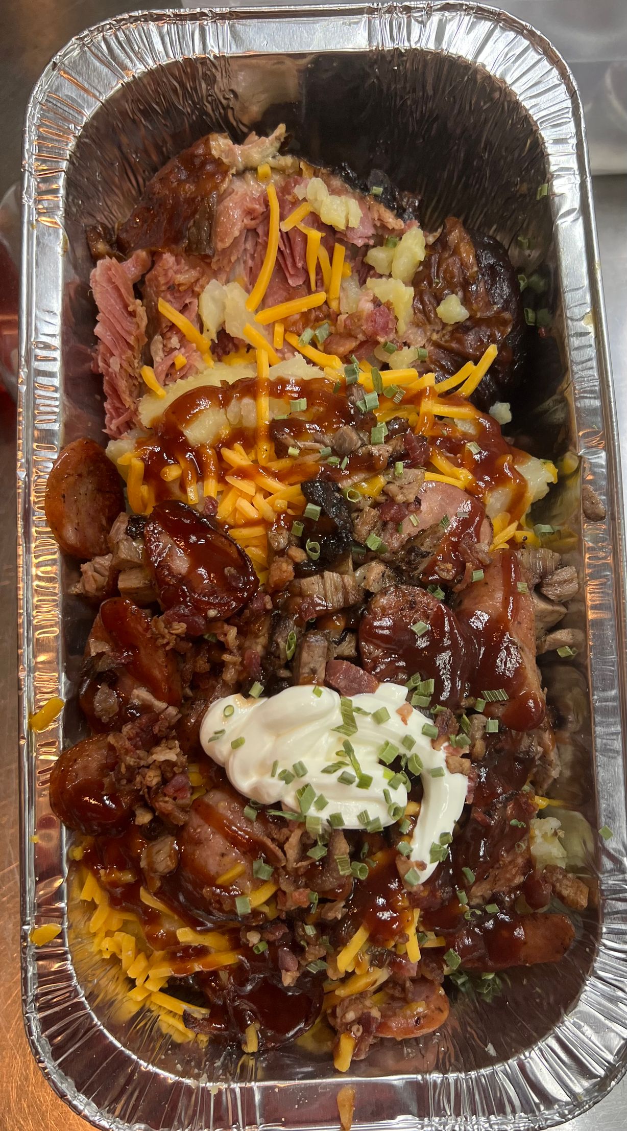 Turkey Leg Loaded Baked Potato at BIG BOIS CHICKEN N WAFFLES in Mesquite, TX 75150 | YourMenu® Online Ordering