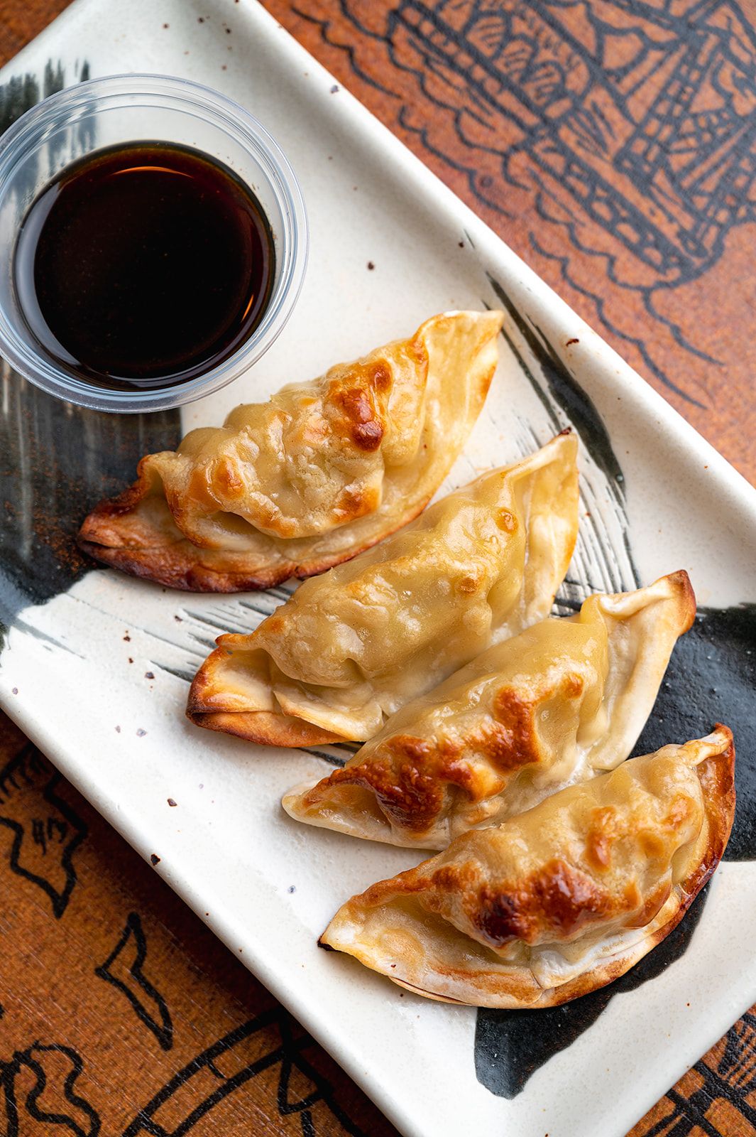 Baked Pork Gyozas at Kraken Crudo in Miami, FL 33137 | YourMenu® Online Ordering