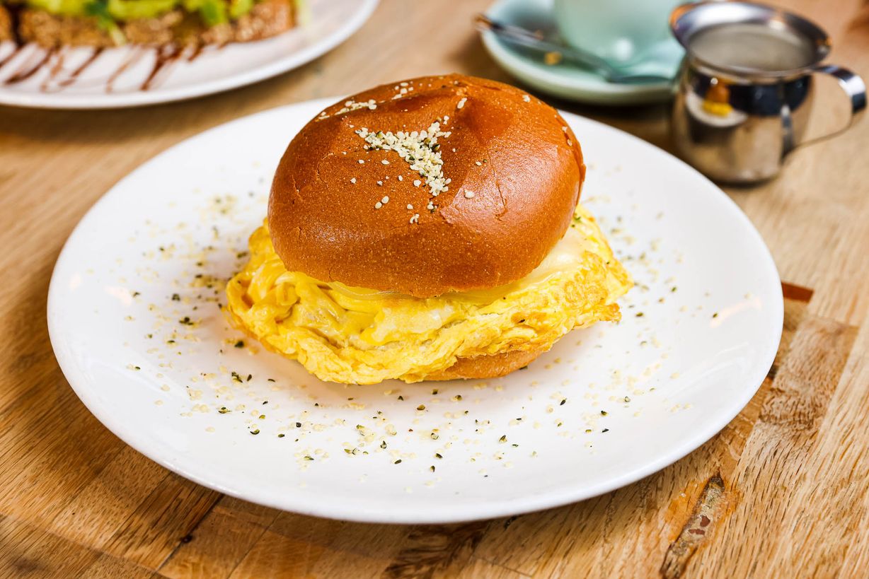 Morning Delight Sandwich (Egg Cheese Tomato Sprouts) at Oakland Coffee & Juice Bar in Oakland Park, FL 33334 | YourMenu® Online Ordering